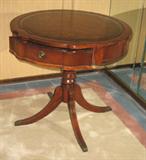 Leather top drum table with pull-out drawer