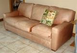 One of 2 leather sofas