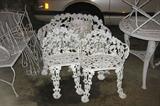 Old heavy wrought iron patio trio of chairs