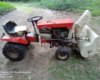 Antique SimplicityTractor with Snowblower and Tire Chains