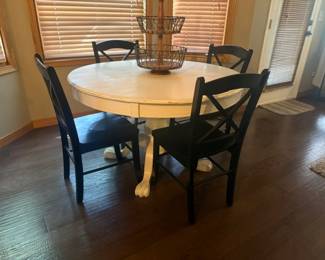 ROUND WOOD PEDESTAL TABLE DISTRESS OFF WHITE PAINT AND 4 WOOD ARMLESS CHAIRS SOLD SEPERATE