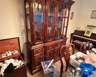 China cabinet full of glassware