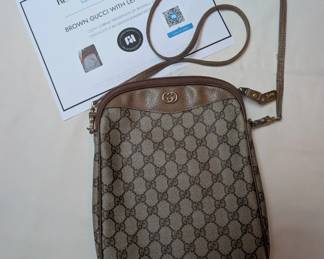 Authenticated Brown Gucci bag with long strap