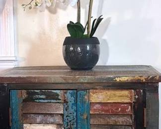 Vintage Rustic Two Door Cabinet, Distressed framed Magnolia Wall Art Artificial Orchid, And Plant