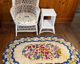 White Wicker Chair And Side Table With Vintage Floral Oval Rug