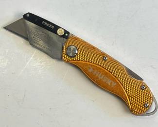 237 huskyfoldingutilityknifewithorange