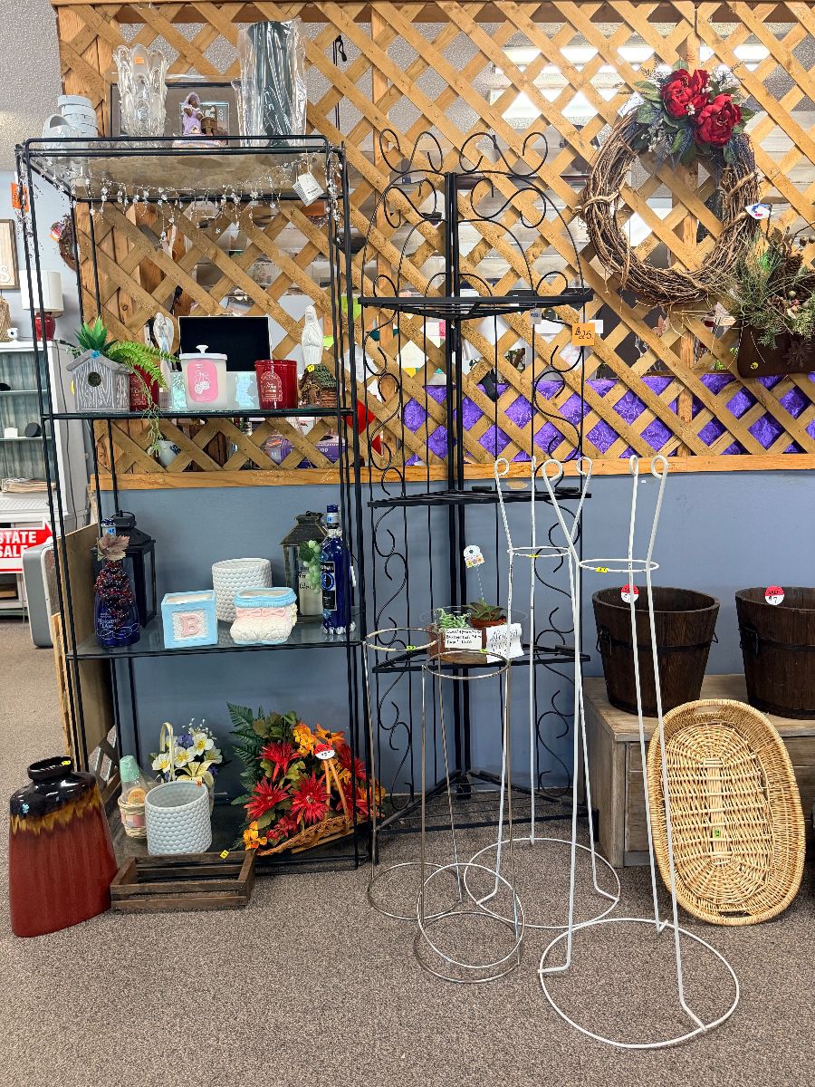 shelves, various vases, and plant stands