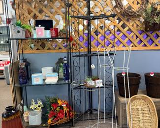 shelves, various vases, and plant stands