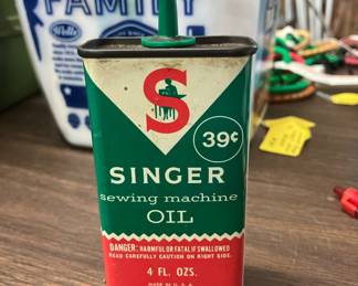 Singer oil can