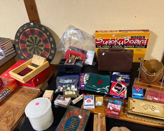 Dart board, vintage playing cards, board games