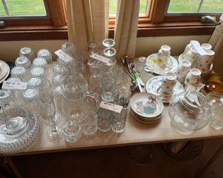 Sets of dishes and glassware
