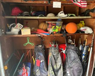 Sets of golf clubs, Ogio golf bag, vintage toys, umbrellas, sports equipment