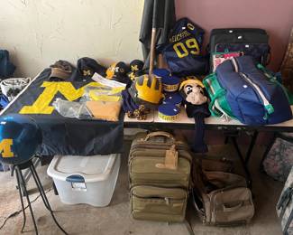 University of Michigan tailgate chairs, Wolverine helmets, Umich hats, lawn ornaments, Vintage U of M dishes, Tailgate bag, luggage.