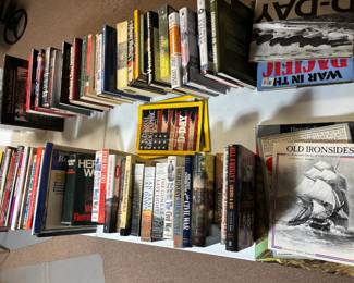 Tons of books- war books, fiction books, non-fiction, National Geographic magazines,