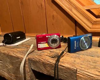Canon camcorder, Kodak digital camera, Canon digital camera.