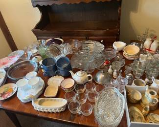 Serving pieces, antique tea sets, crystal glasses, salt and pepper shakers, platters