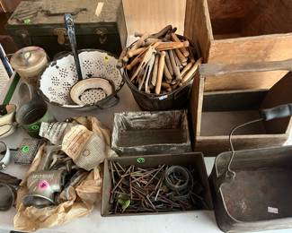 Antique cookware, green and white enamel ladle, wooden crates, metal tins, vintage clothespins, and more!