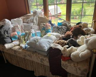 Bedding, linens, pillows, vintage stuffed animals.