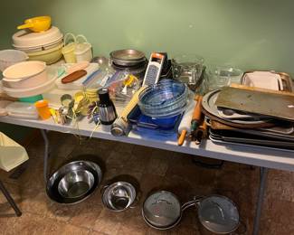 Tons of baking sheets, PYREX pans, vintage wood rolling pins, marble rolling pins, stainless steel bowls and much more!