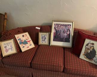Vintage plaid couch, framed Norman Rockwell art prints