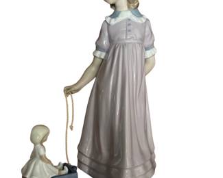 091 Lladr Girl Pulling Baby in Wagon Figurine