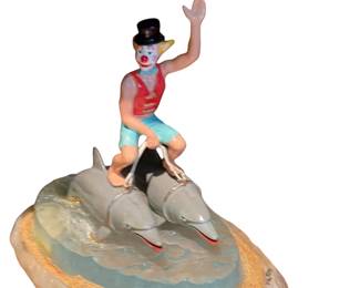 071 Clown Riding Dolphins Figurine on Stone Base