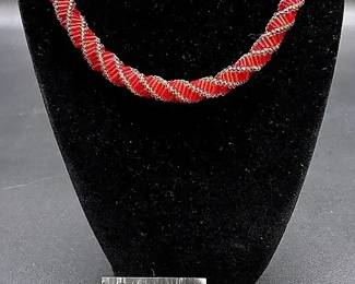 Red Toned Necklace And Pins