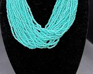 Turquoise Colored Beaded Necklace And Earrings