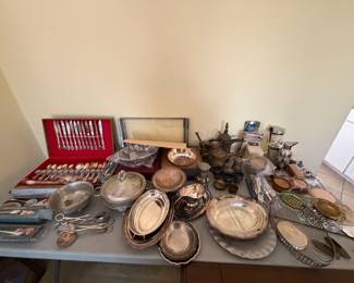 Silver and silver plate, flatware, and serving pieces. Miscellaneous bar items.