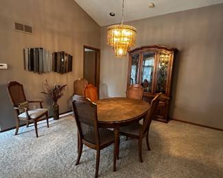 Dining room set with six chairs and two leaves and covers