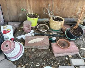 PLENTY OF OUTDOOR POTS AND PAVERS