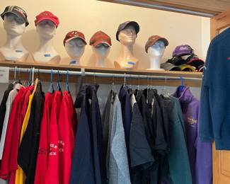 Lots of never worn hats and clothes