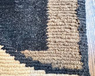 Close up: Himalayan wool- lama Tufenkian rug in black and beige motif- 9'x12'- $3500