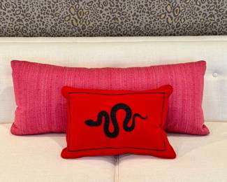 (pink scalamandre lumbar pillow- 2 available- 32x12- $200), (Sferra Year of the Snake decorative pillow- 18x12- $100)