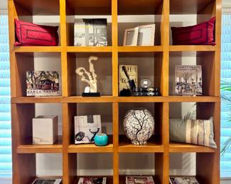 An ecclectic mix of elegant furnishings await you! (Michael Vanderbyl for Baker Archetype bookcase- 74x18x80- $3500)