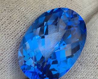 15.38 Carat Exclusive Johnny Wang Glacier Blue™ Topaz Oval Cut Loose Gemstone