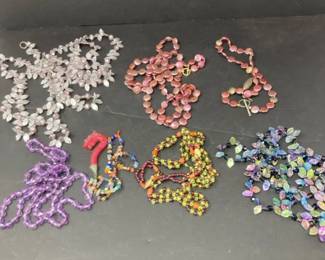 Large Lot of Costume Jewelry Necklaces, Earrings, Bracelets, and Decorative Ornaments
