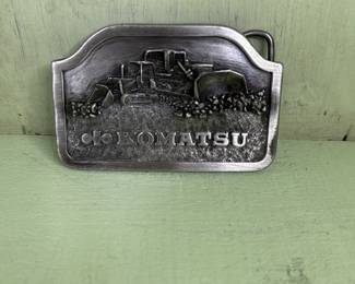 komatsu embossed belt buckle 1982
