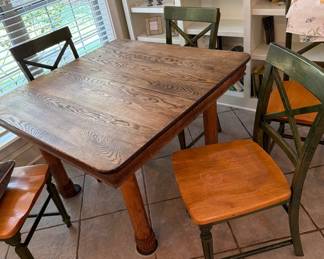 Breakfast table; six chairs sold separately