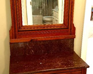 Dresser of antique set has marble top