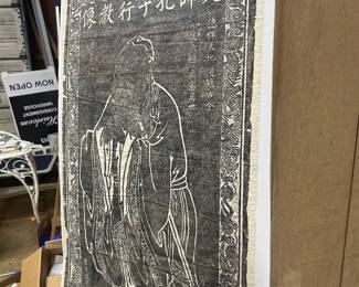 4 feet tall Confucius