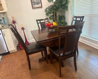 dining table and 4 chairs with fold down leaves