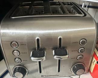 Toastmaster 4-Slice Stainless Steel Toaster with Bagel, Reheat, and Cancel Functions