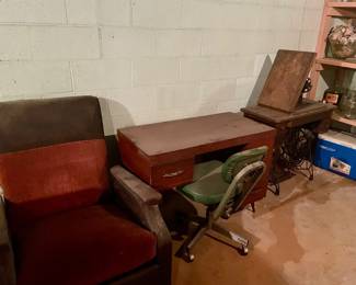 Vintage desk and chair. Antique sewing machine treadle style. Sorry no better pictures.