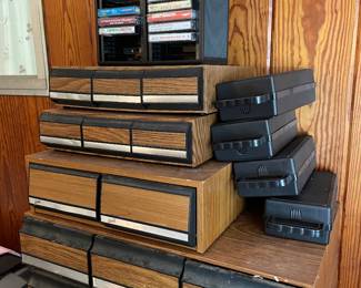 Cassette and tape holders with some cassette tapes of various artist mostly 80’s and 90’s country and gospel
