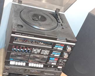 Turn table 5 disk changer, dual cassette am fm stereo  Sanyo speakers  beautiful well taken care of