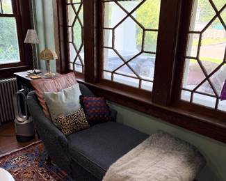 Chaise, pillows, bedding, throws