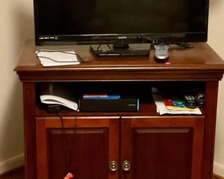 Tv and cabinet