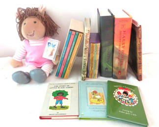 Lot 167: Plush doll with a collection of children's books