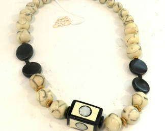 Lot 130: Hand Cut Ox Bone and Horn Tribal Necklace